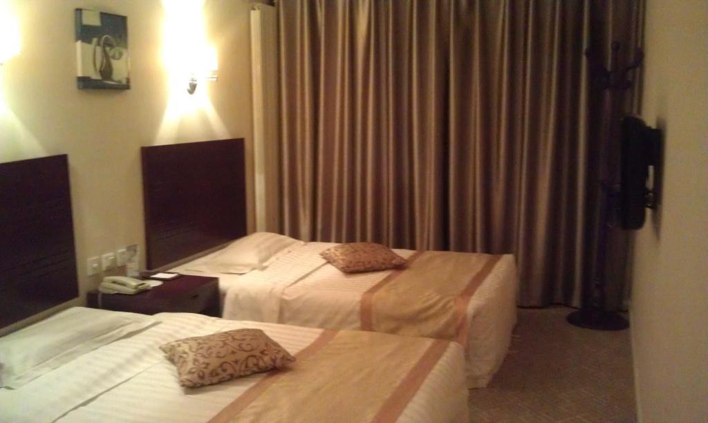 Dajiaoting International Business Hotel Pekín Habitación foto